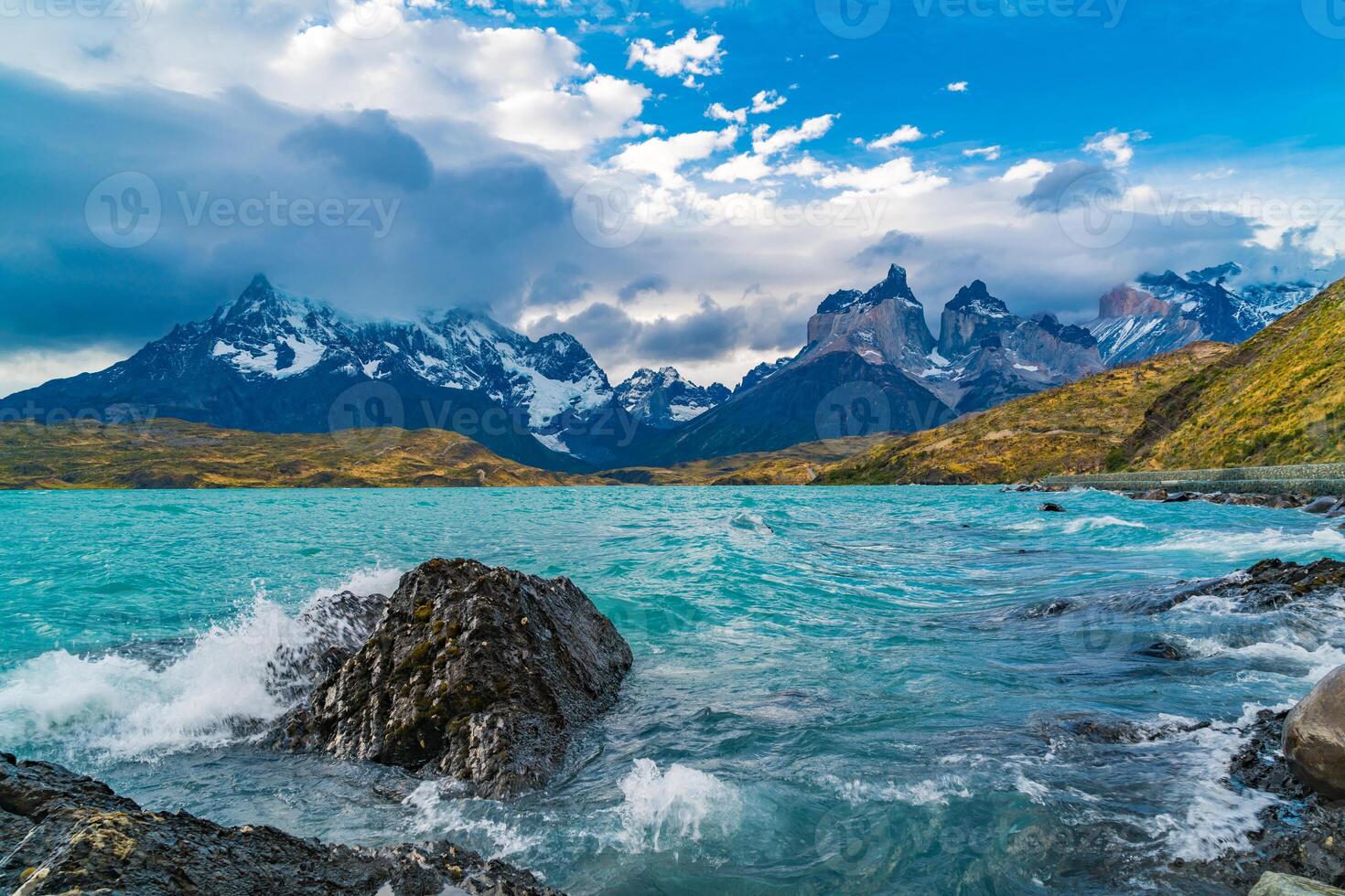 Beautiful scenic landscape at Lake Pehoe and Cuernos del Paine Mountains in the evening at Torres del Paine National Park in Chile photo