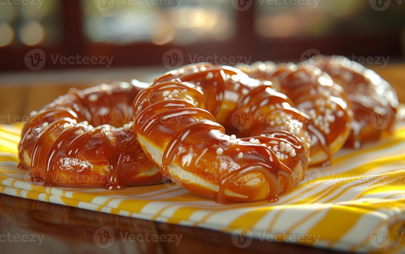 AI generated Close up of caramel drizzle atop golden brown pretzels photo