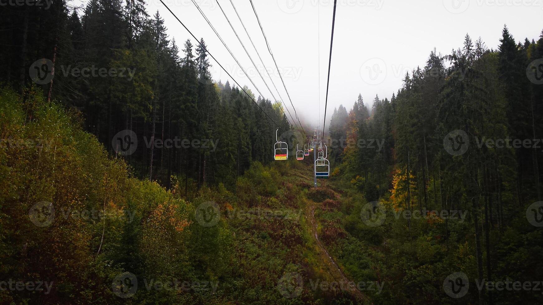 Cable car in autumn Carpathian mountains photo