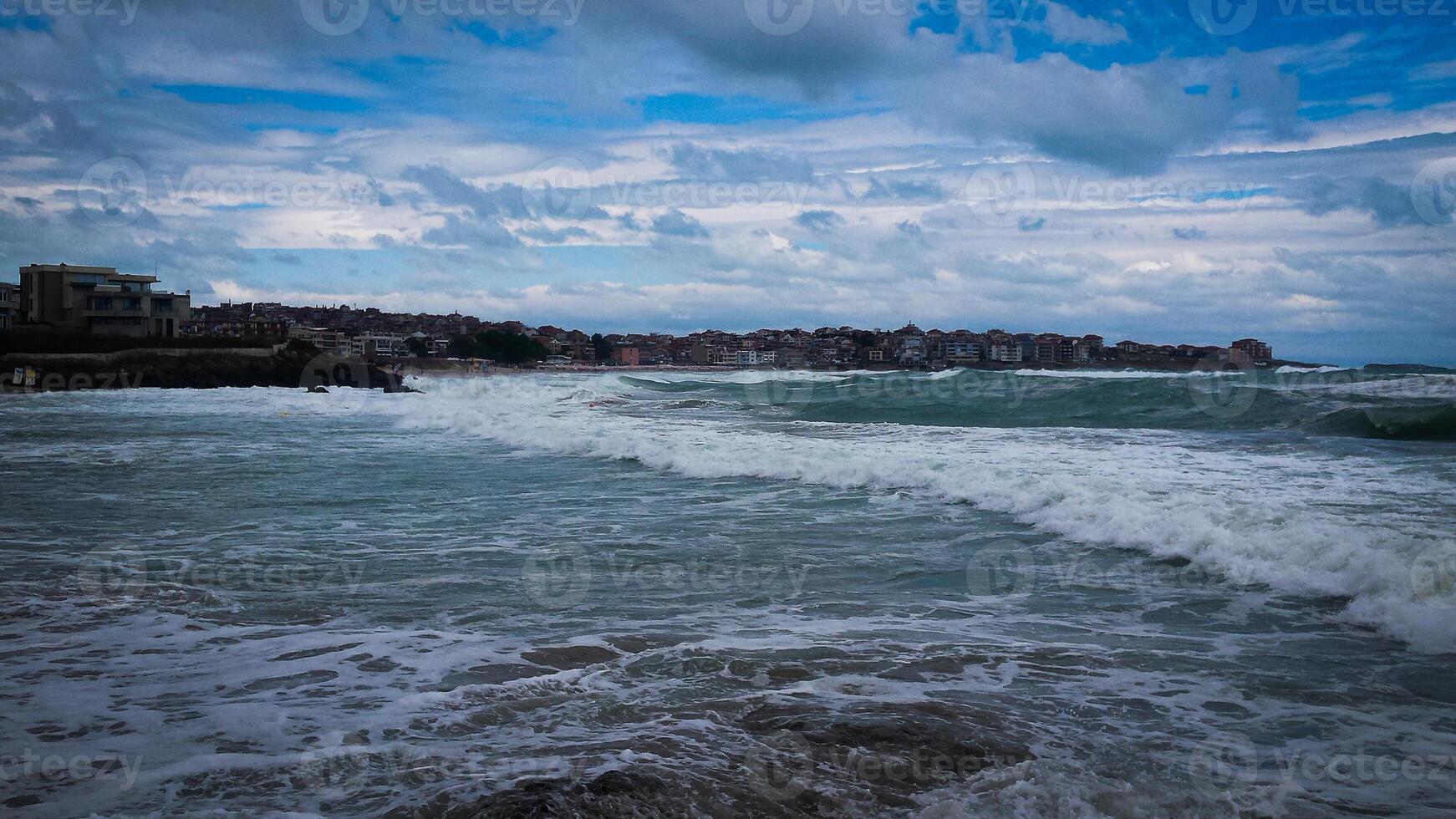 A fragment of the old town of Sozopol, Bulgaria. The sea after the rain photo