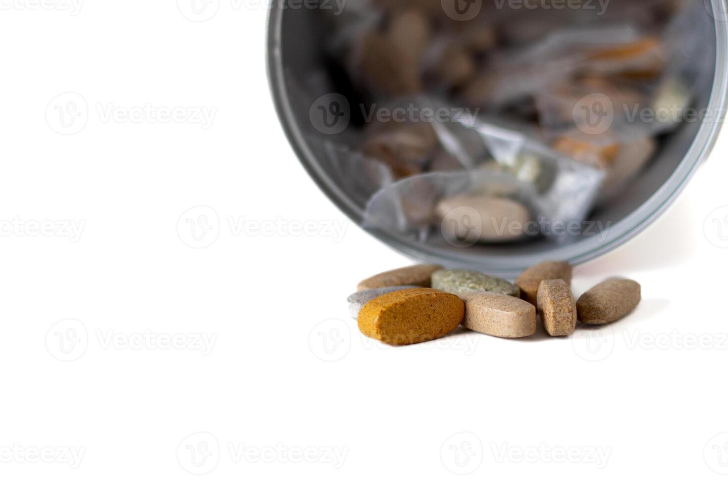 A portion of a dietary supplement of vitamins photo