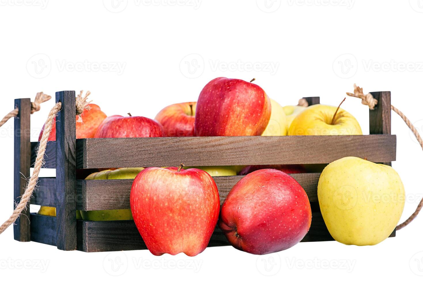 Apples in and near a wooden box. Yellow and red apples. Fruits, healthy food. photo