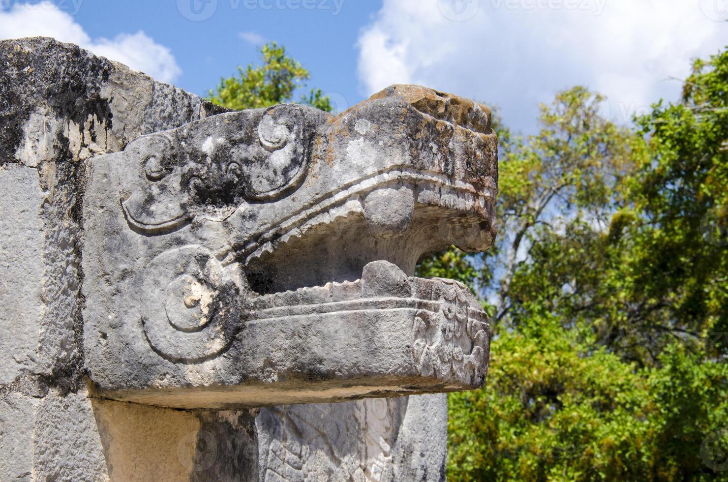 Close up of a serpent head at Chichen Itza, Wonder of the World photo