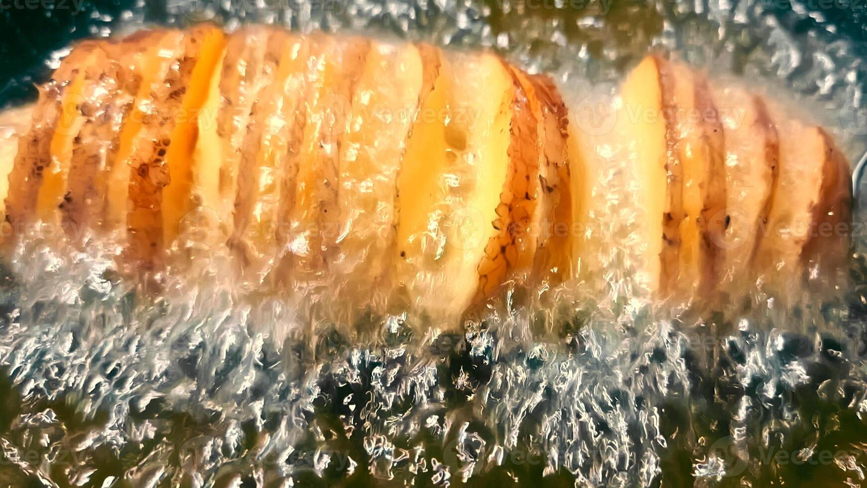 Close-up of potatoes fried in olive oil. Fry pan potatoes photo