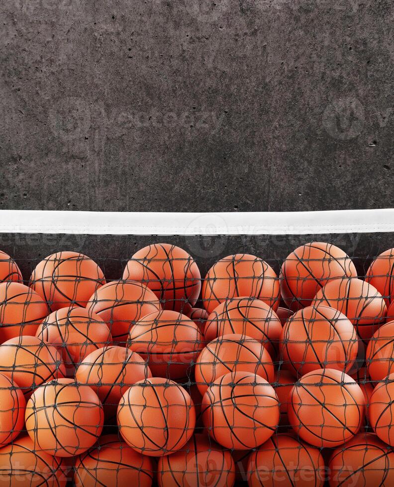 Several basketball balls in the net. Cement background. photo