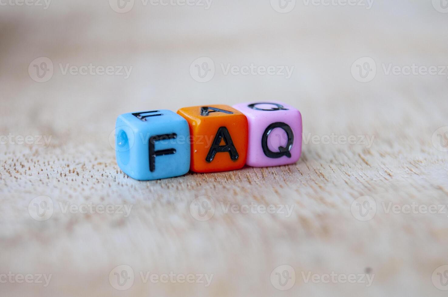 Close up of FAQ letters representing frequently asked question photo