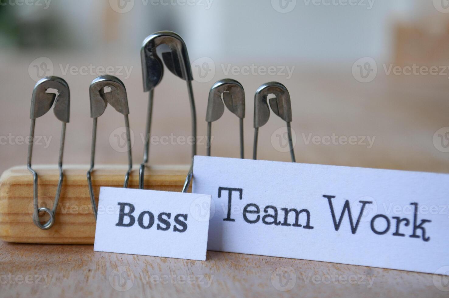 A leader or a boss is sitting with his or her followers or staff. Leadership concepts photo