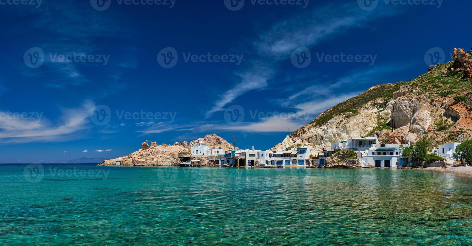 The beach of Firapotamos in Milos, Greece photo