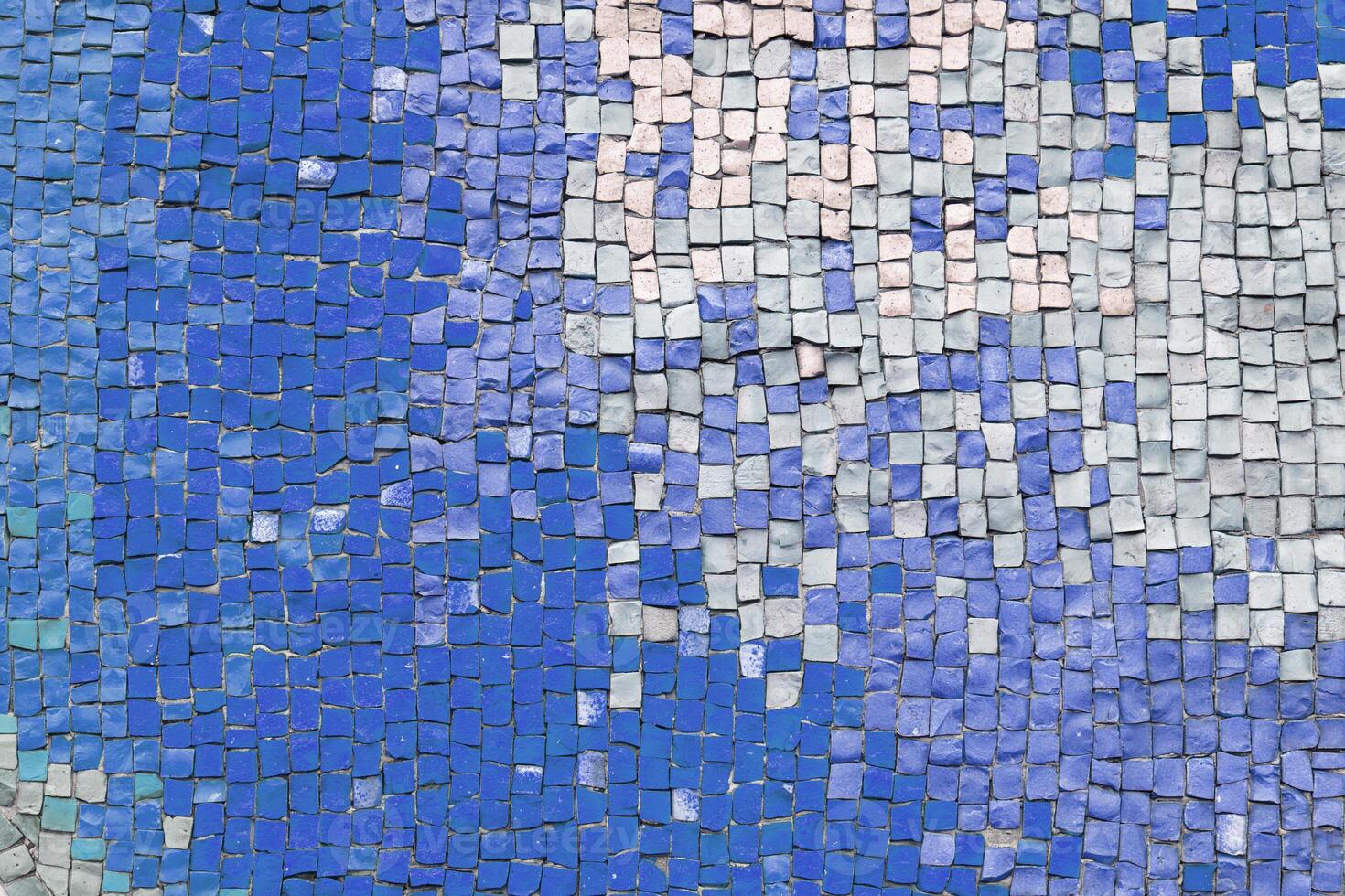 Abstract mosaic ceramic tile background, pattern of blue and white tiles, wall decor photo