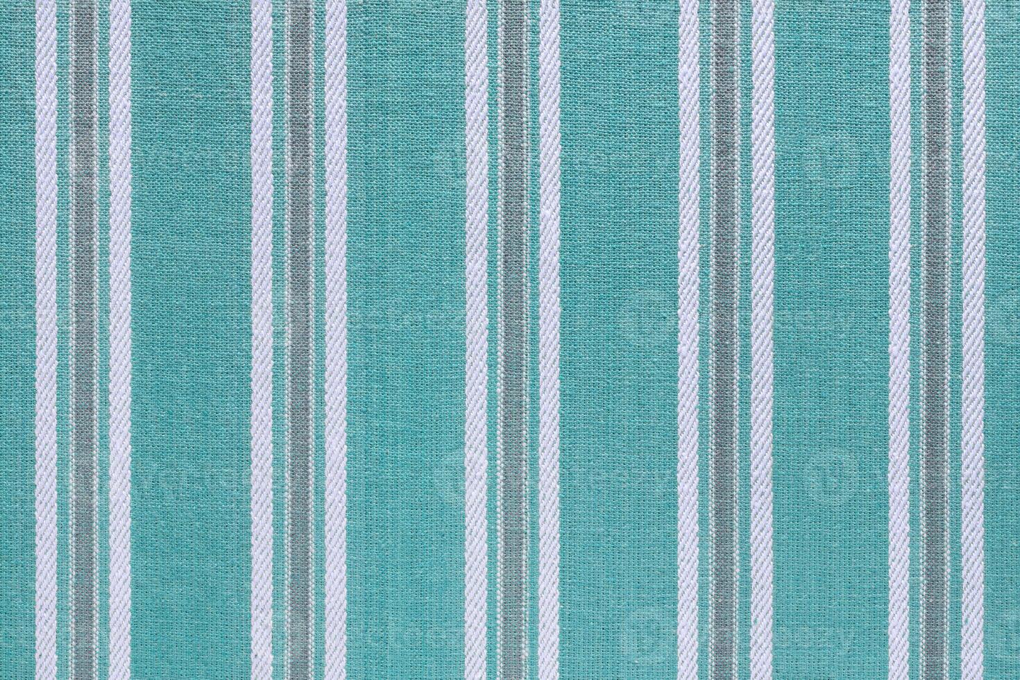 Natural turquoise linen texture with striped pattern as background, wallpaper photo