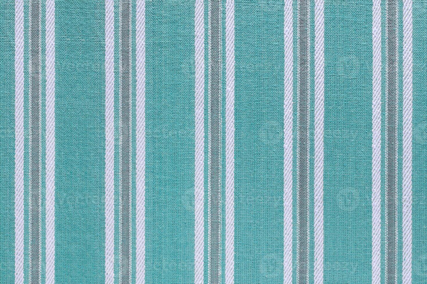 Natural turquoise linen texture with striped pattern as background, wallpaper photo