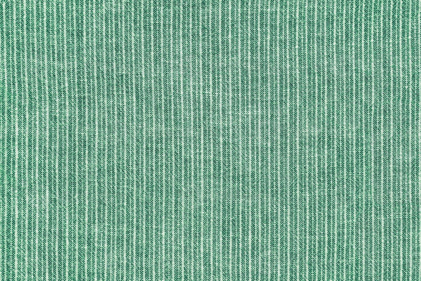 Natural green linen texture with striped pattern as background, wallpaper photo