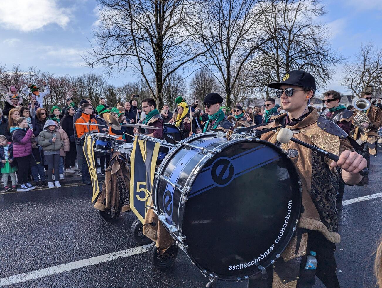 Galway, Ireland  03.17.2024 Saint Patrick's Day parade passing trough Galway city in Ireland photo