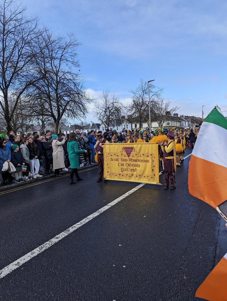 Galway, Ireland  03.17.2024 Saint Patrick's Day parade passing trough Galway city in Ireland photo