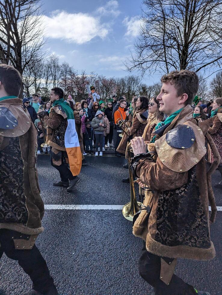 Galway, Ireland  03.17.2024 Saint Patrick's Day parade passing trough Galway city in Ireland photo