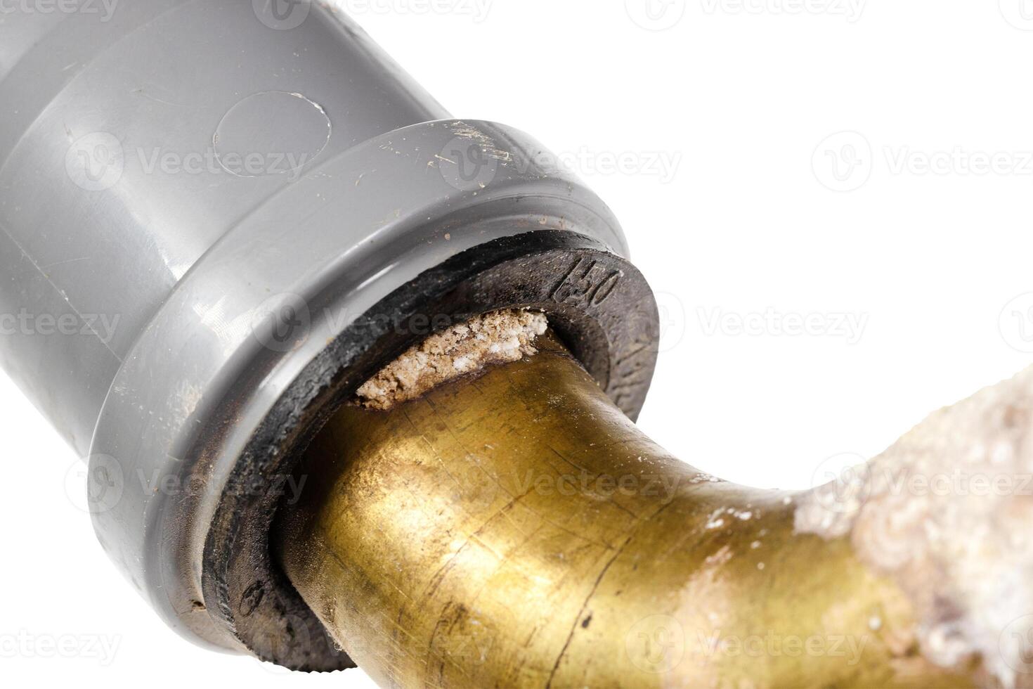 salt deposits on plastic elbow of drain pipe photo