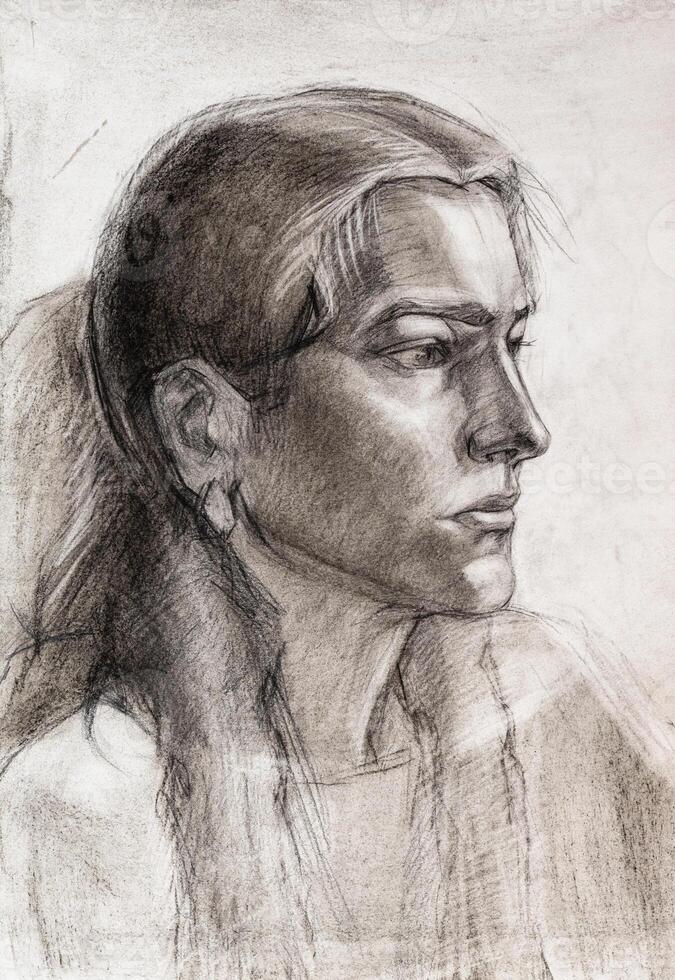 portrait of caucasian woman hand drawn by charcoal photo