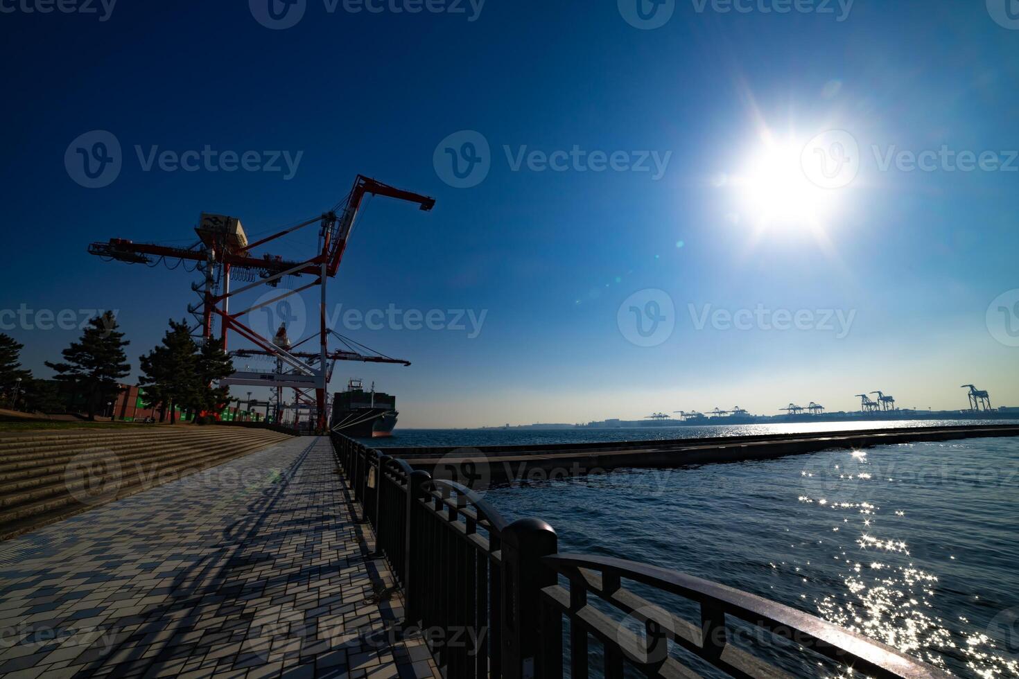 Containers and cranes near the port in Aomi Tokyo wide shot photo