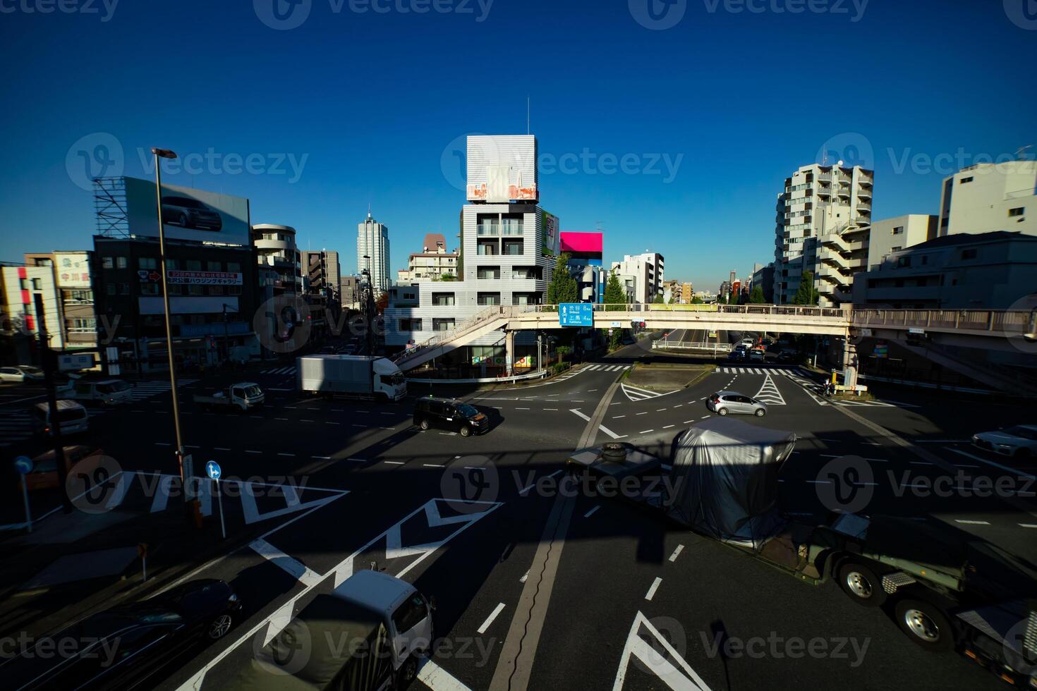 A traffic jam at the crossing in Tokyo wide shot photo