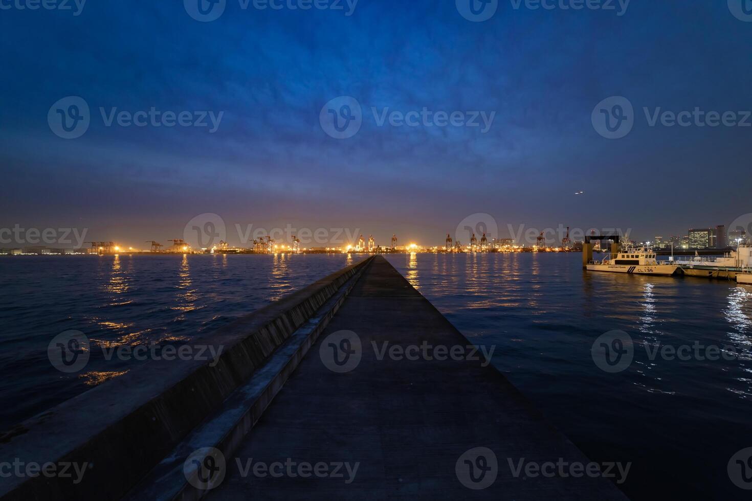 A dusk cityscape near the container port in Tokyo wide shot photo