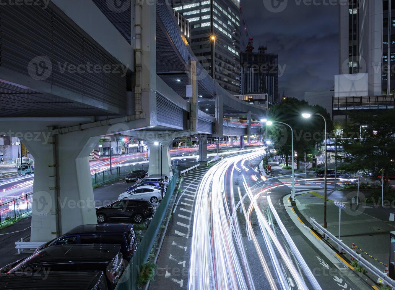 A night traffic jam at the urban street in Tokyo wide shot photo