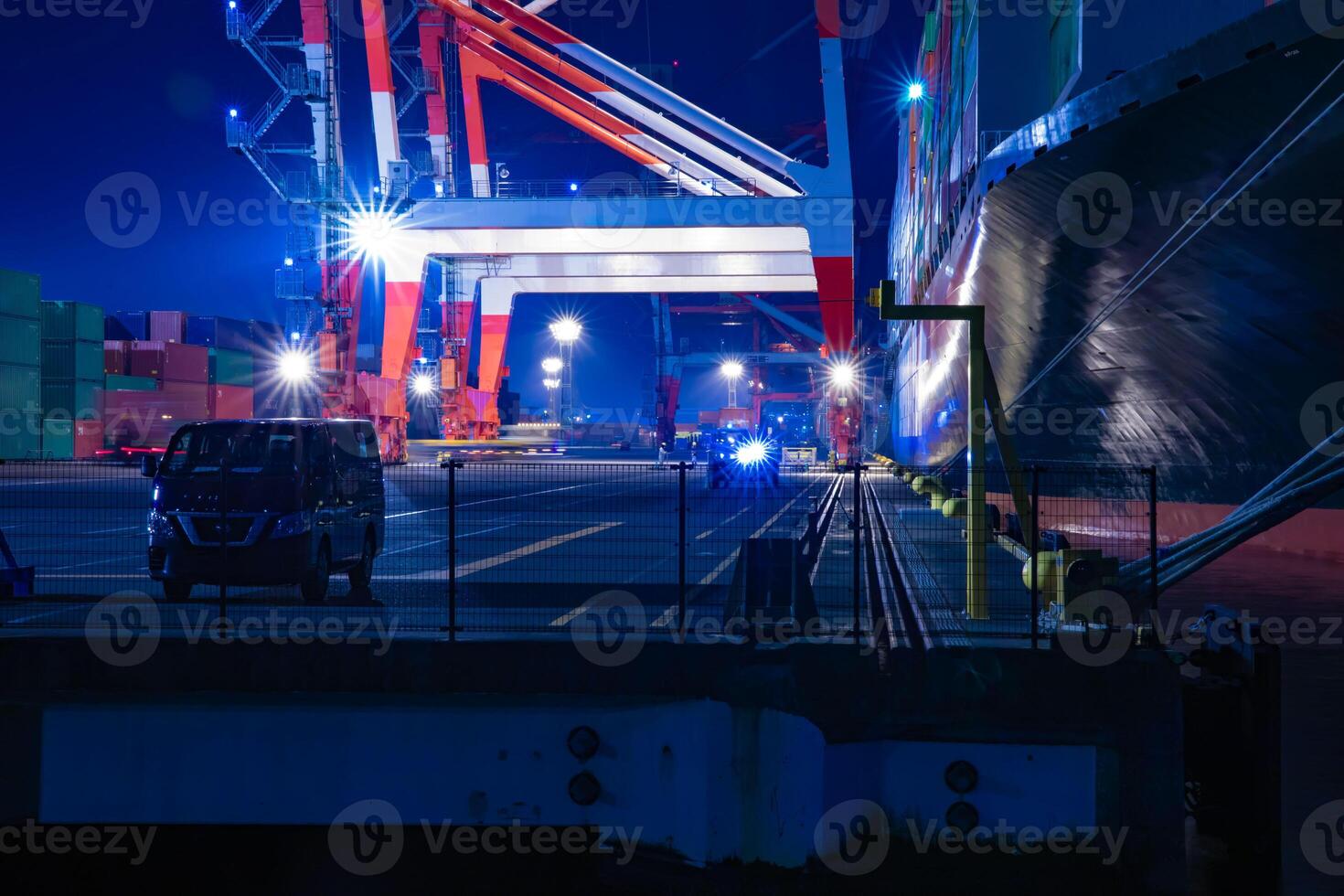 Night crane near the container port in Tokyo photo