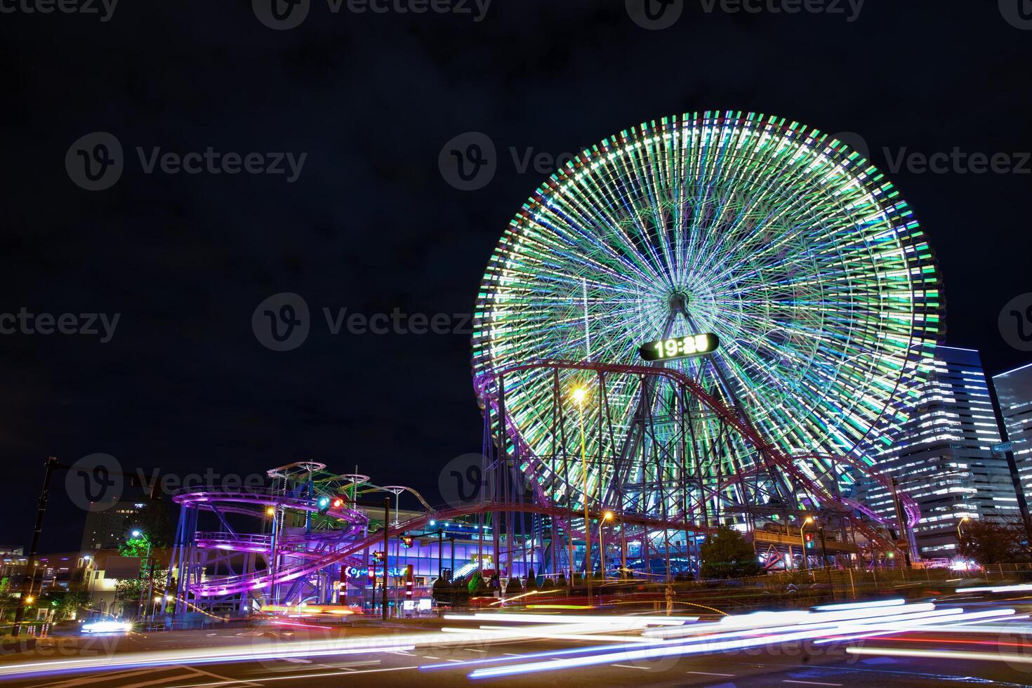 A night illuminated ferris wheel in Yokohama wide shot photo