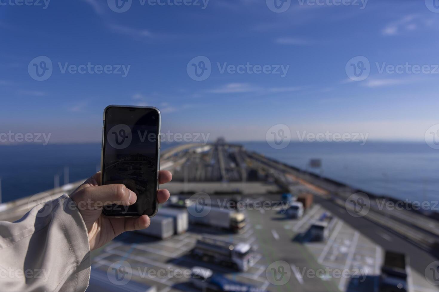 A traffic jam shooting by smartphone on the highway at Tokyo bay area in Chiba photo