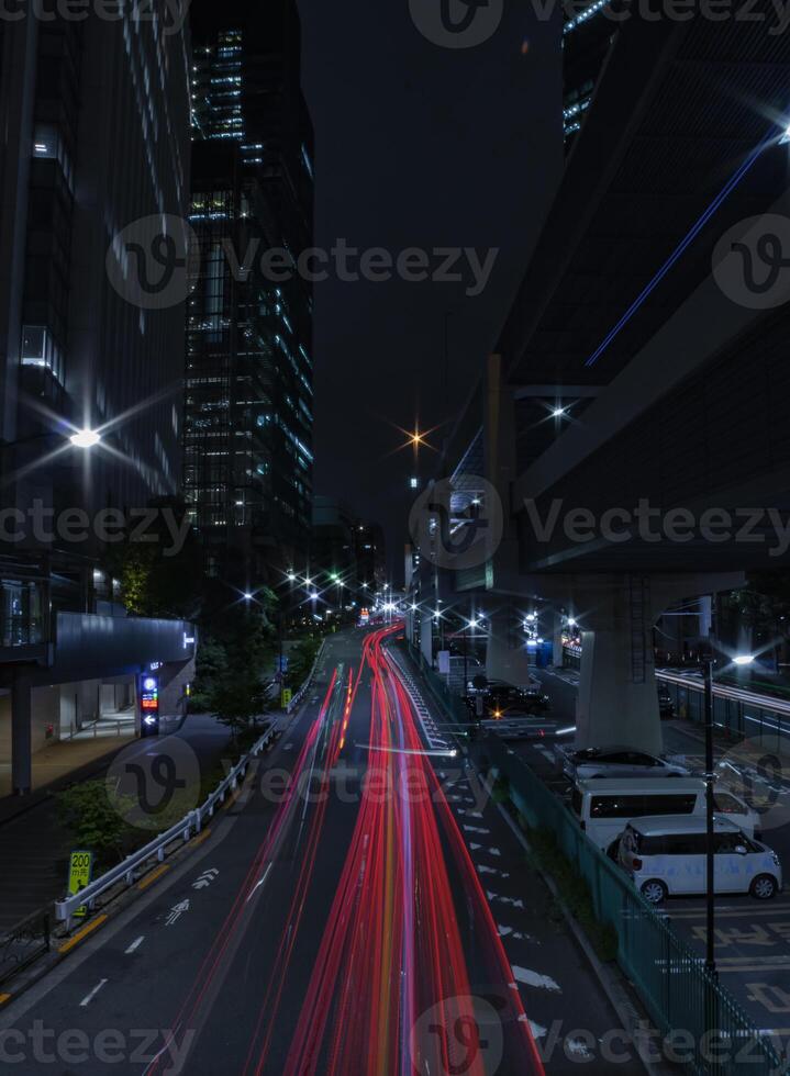 A night traffic jam at the urban street in Tokyo wide shot photo