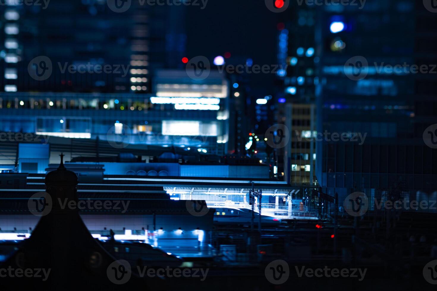 A night miniature cityscape in front of Tokyo station tiltshift photo