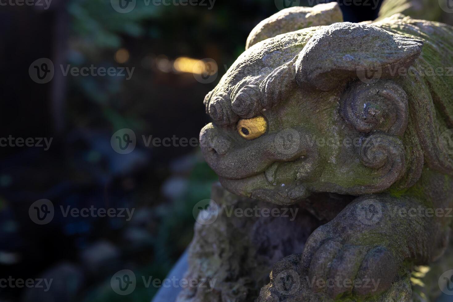 A statue of guardian dog at Japanese Shrine photo