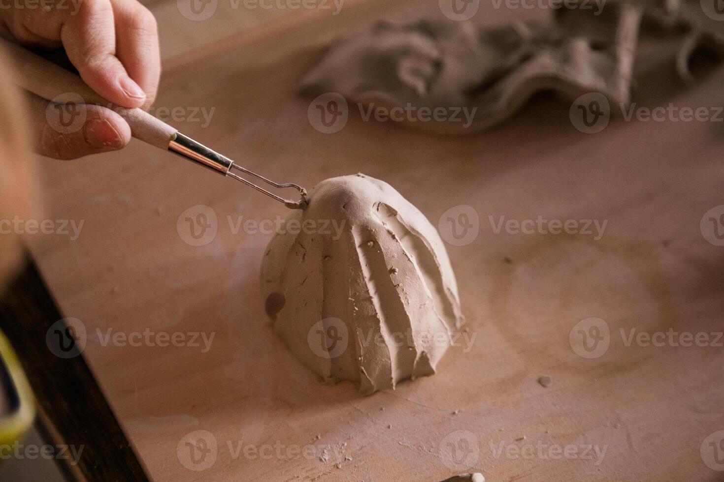 Handmade Clay Art CloseUp of Children Hands in Ceramics photo