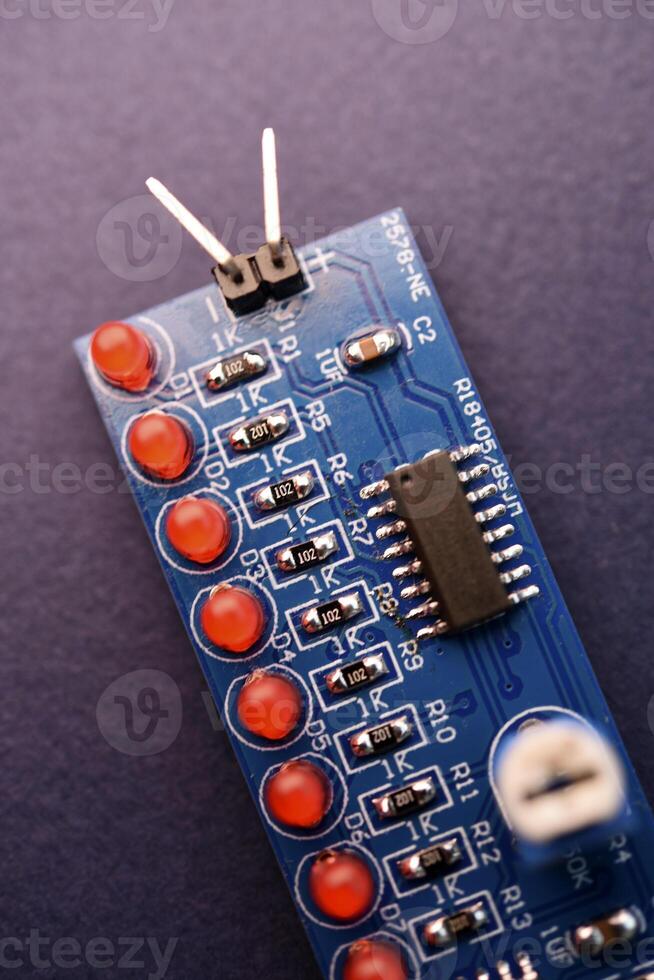 A printed circuit board with radio elements. LEDs and chips. A set for soldering an amateur radio. photo