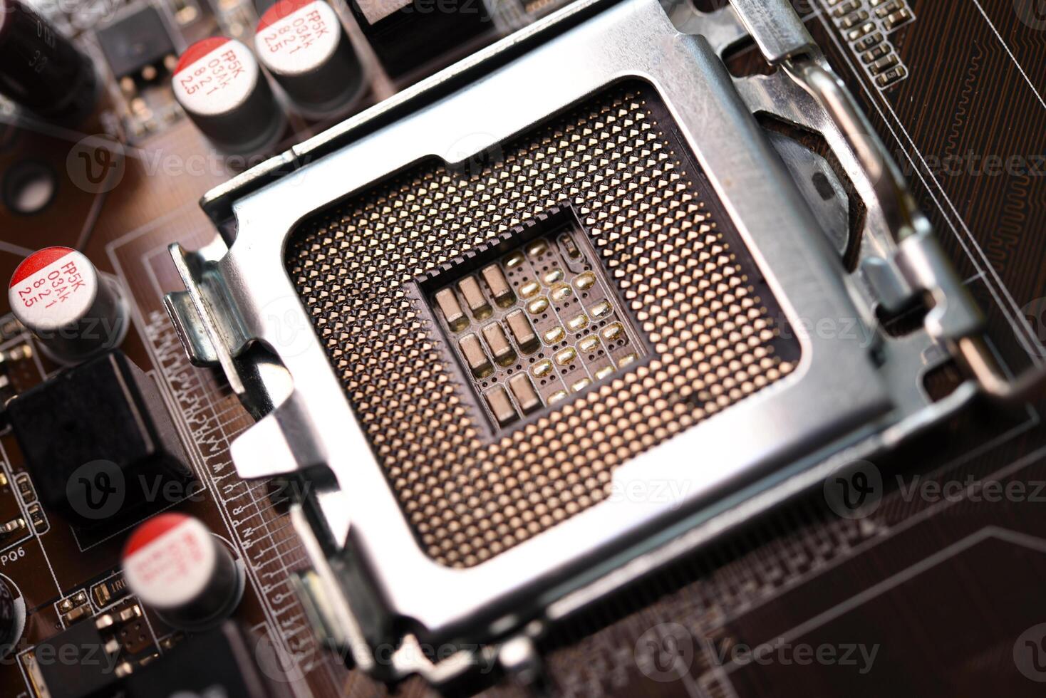 Microprocessor and socket on the motherboard. Computer radio components. Microchips and chips. photo