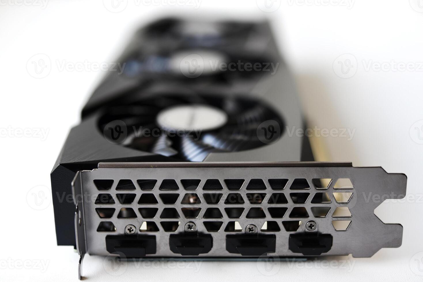 A black and white video card on a white background. Fans and the graphics card case. Computer accessories. photo