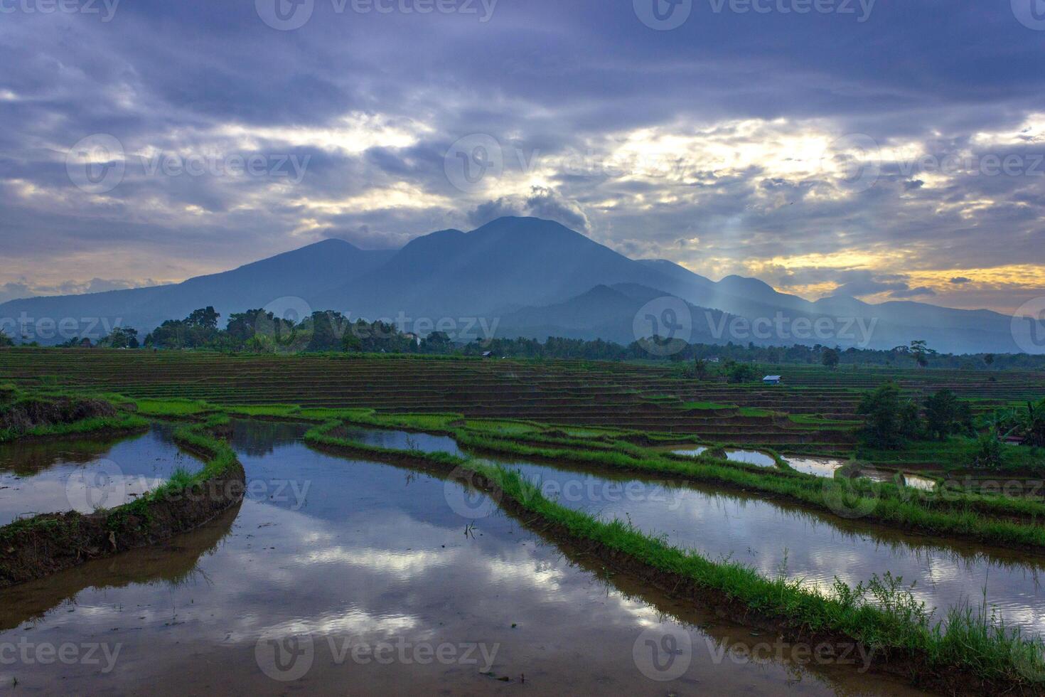 beautiful morning view from Indonesia of mountains and tropical forest photo