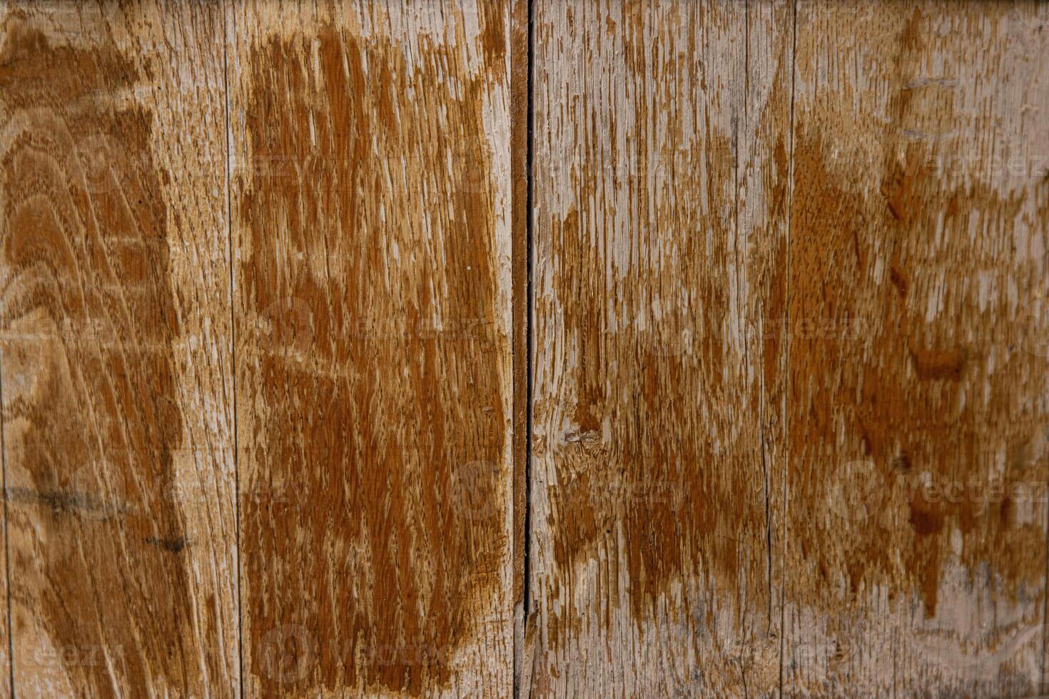 Vintage brown barrel wooden planks background texture with scratches and black stains over wood grain of old aged oak barrel bottom, close up photo