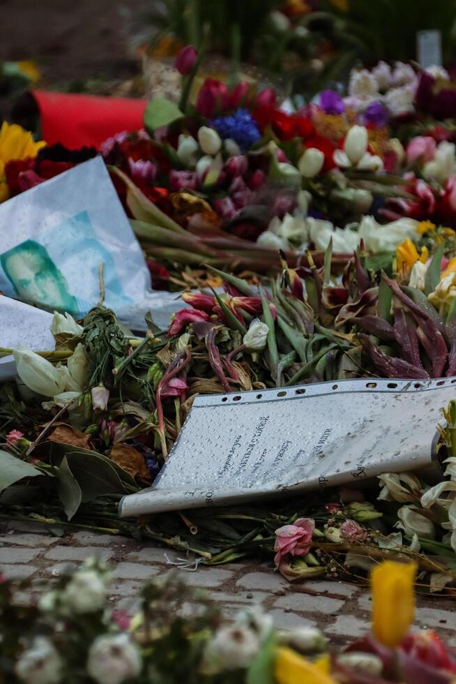 Berlin, Germany. March, 3rd, 2024. Navalny spontaneous memorial with lots of flowers, candles, photos in front of Embassy of Russian Federation after the death of Russian politician Alexei Navalny.