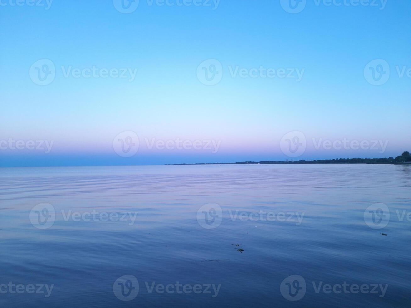 blue sunset over the lake photo