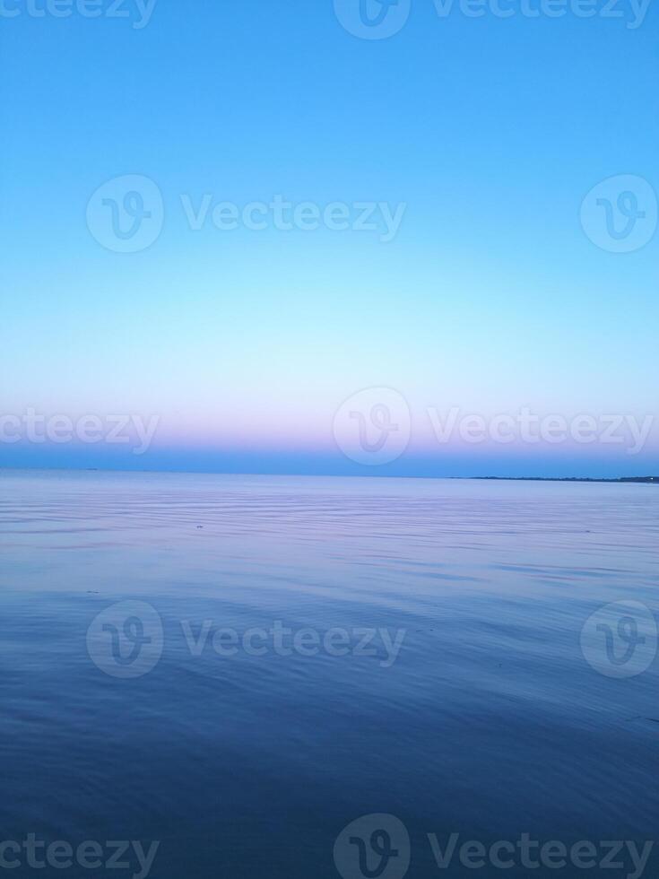 blue sunset over the sea photo