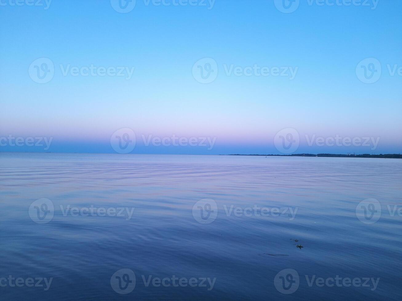 quiet blue sea and sky photo