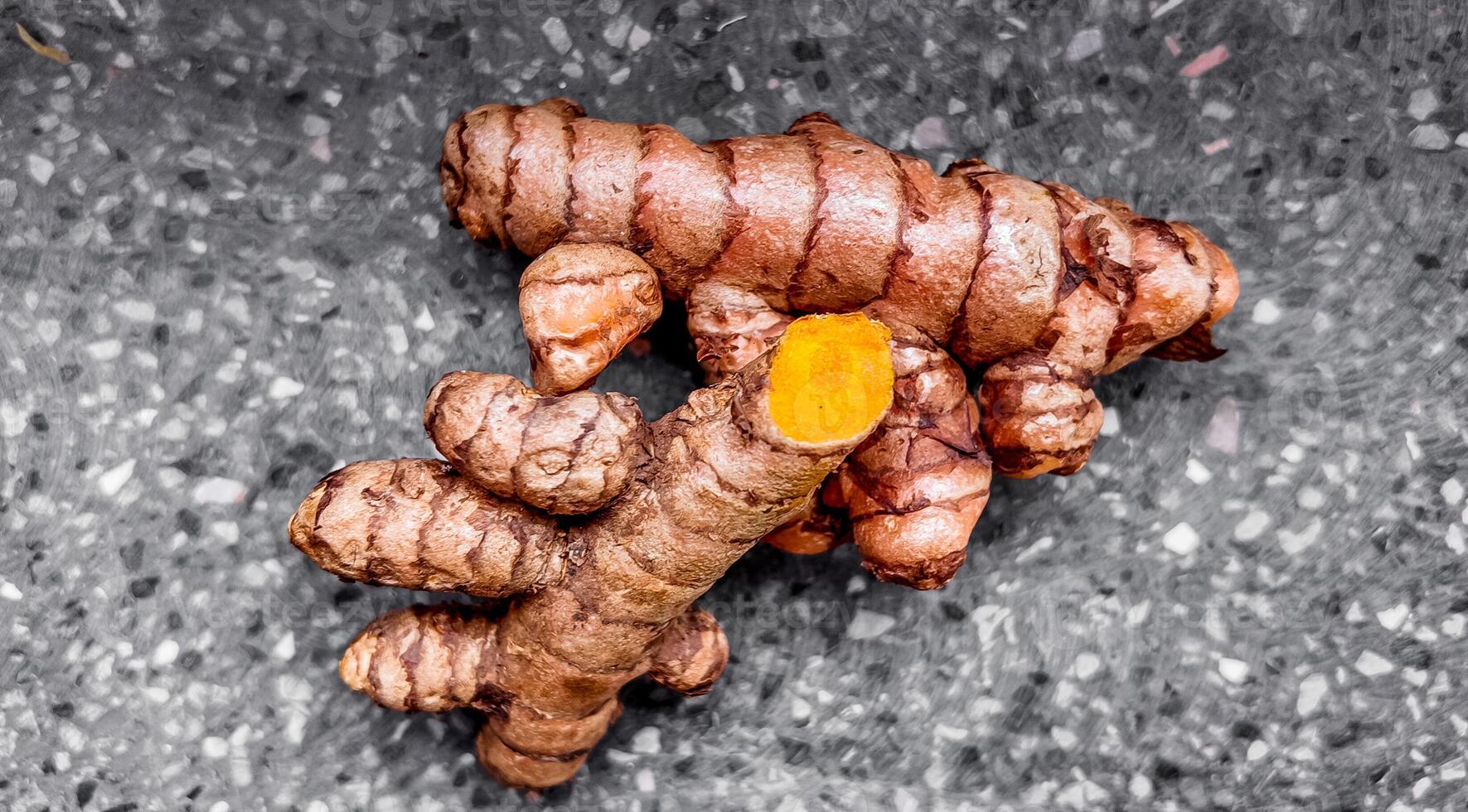 Organic Fresh Turmeric Roots Health Concept photo