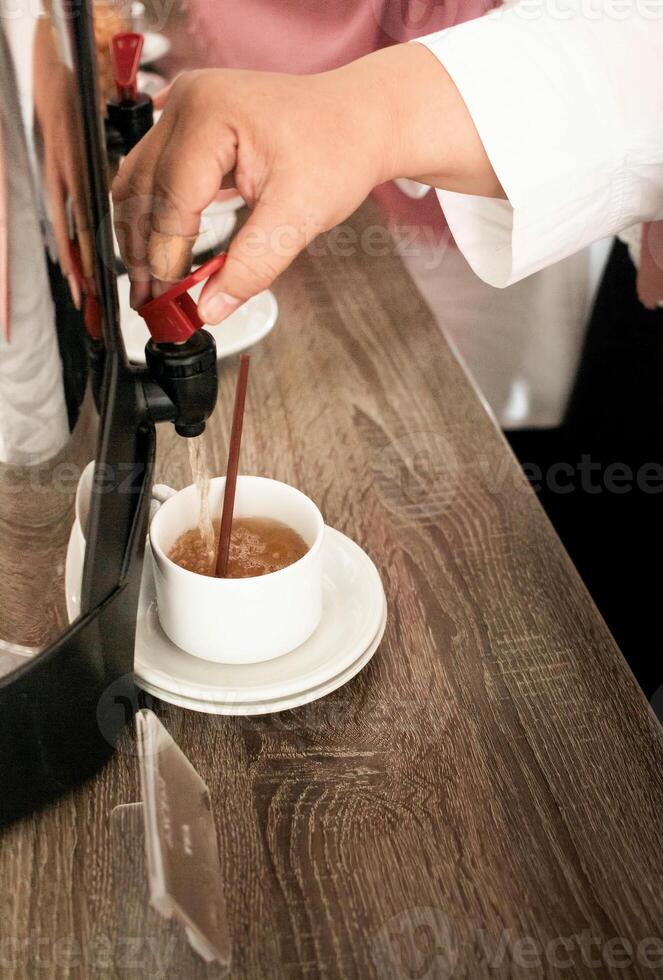 Seminar participants get coffee drinks during a business conference meeting coffee break photo