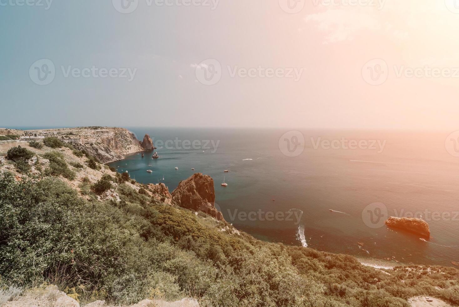 Sea lagoon. Panoramic view on calm azure sea and volcanic rocky photo