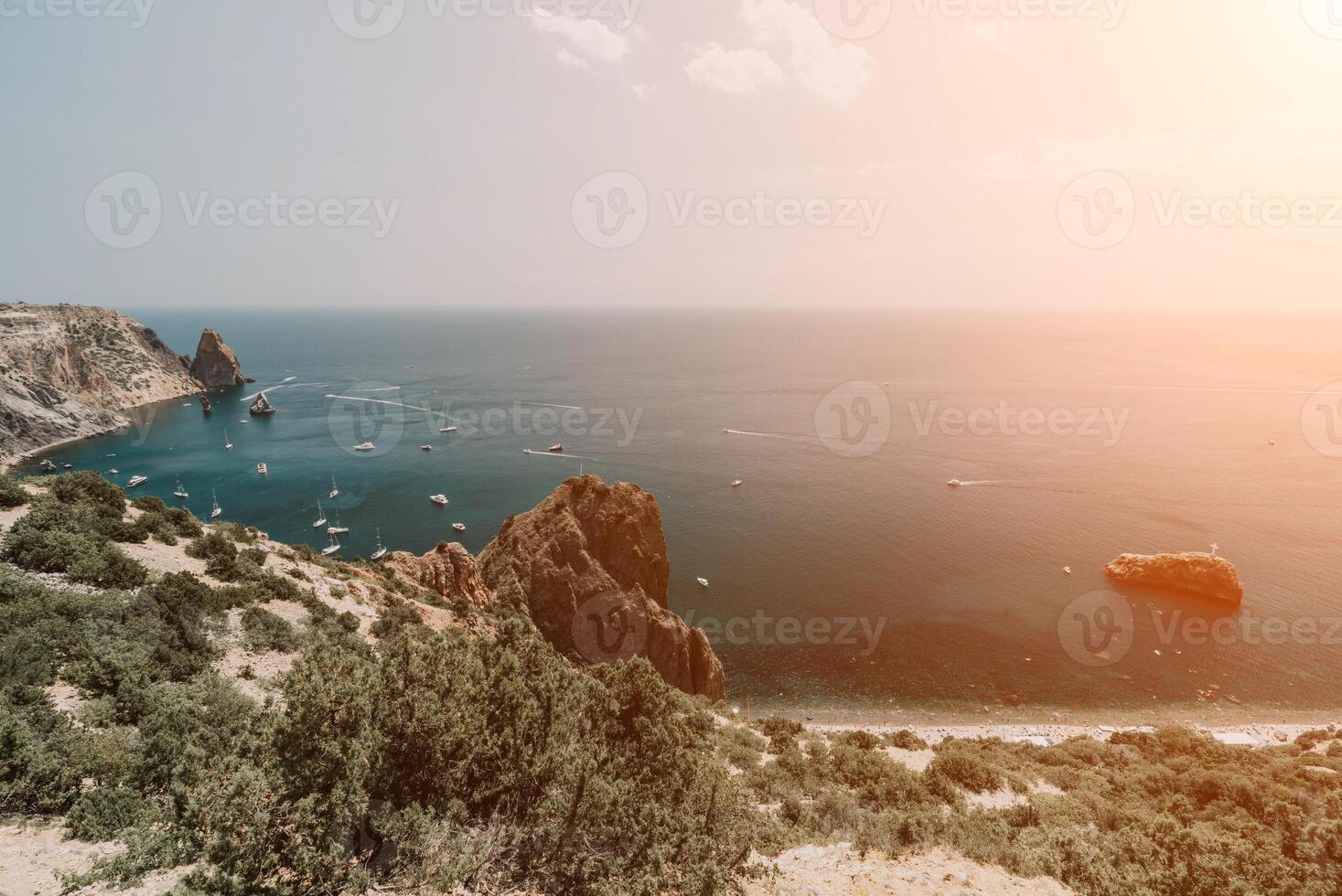 Sea lagoon. Panoramic view on calm azure sea and volcanic rocky photo