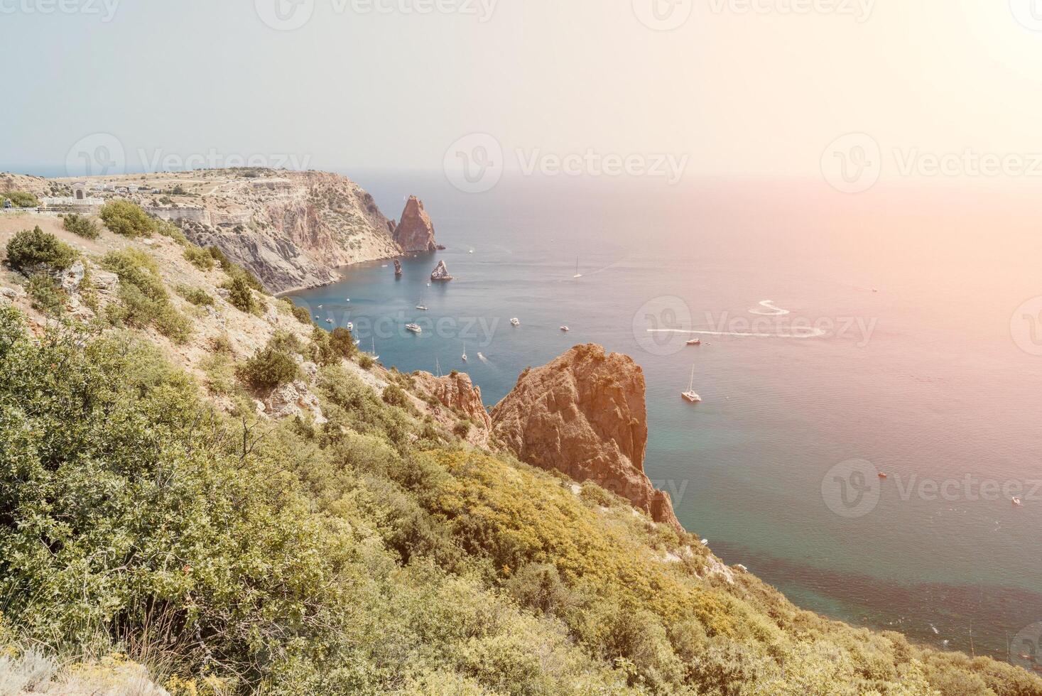 Sea lagoon. Panoramic view on calm azure sea and volcanic rocky photo