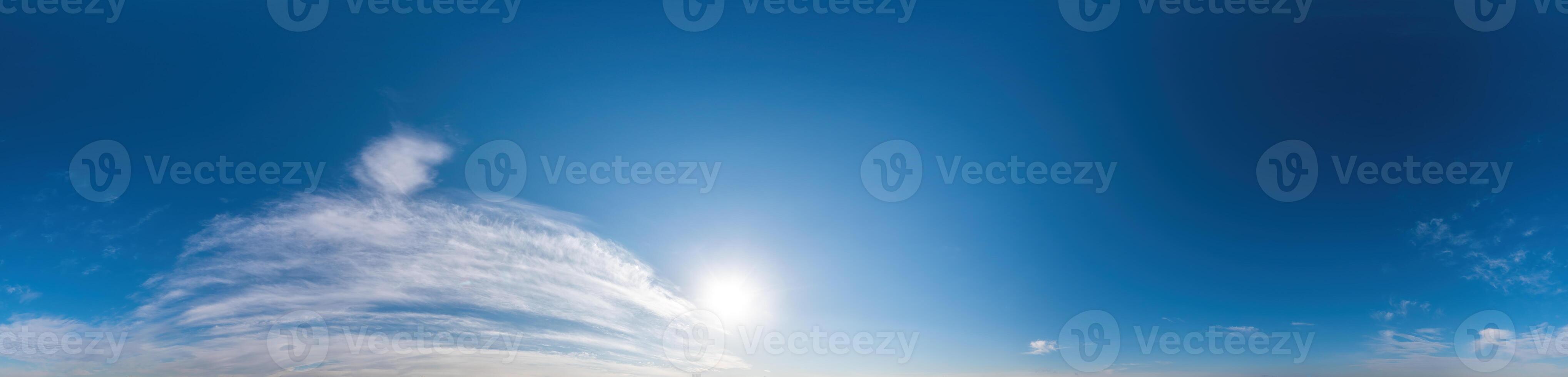 Blue sky with Cirrus clouds Seamless panorama in spherical equirectangular format. Complete zenith for use in 3D graphics, game and for composites in aerial drone 360 degree panoramas as a sky dome photo