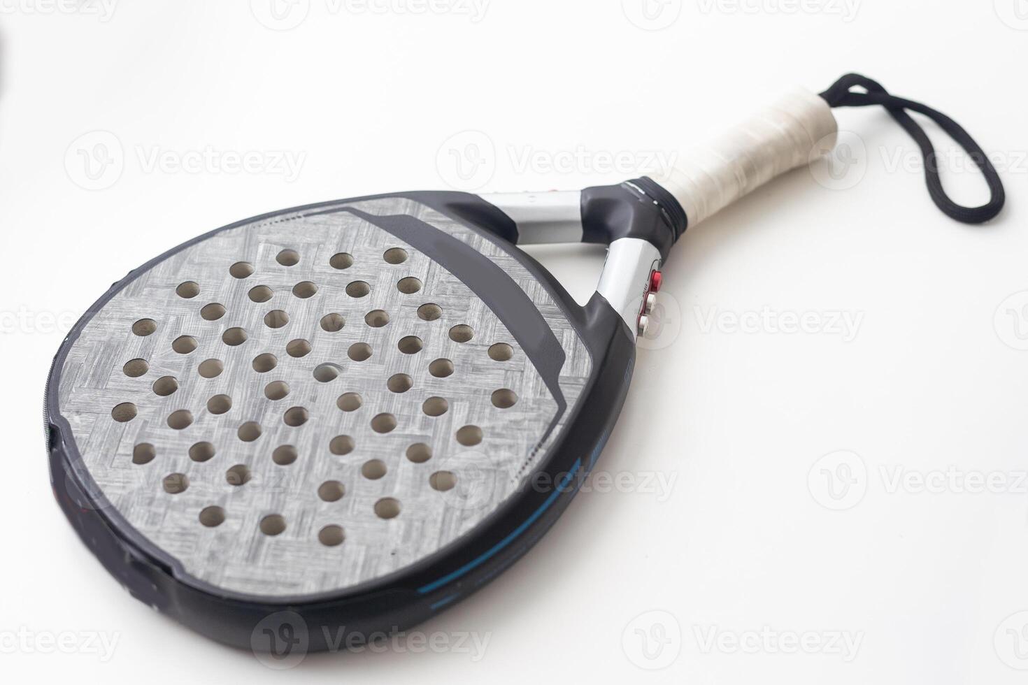 blue professional paddle tennis racket isolated on white background. portrait sport theme poster, greeting cards, headers, website and app photo