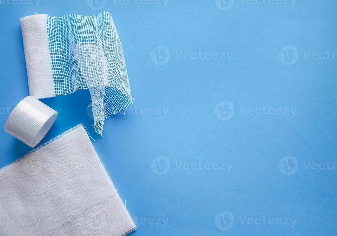 Healthcare Concept Medical Gauze on Blue Background photo