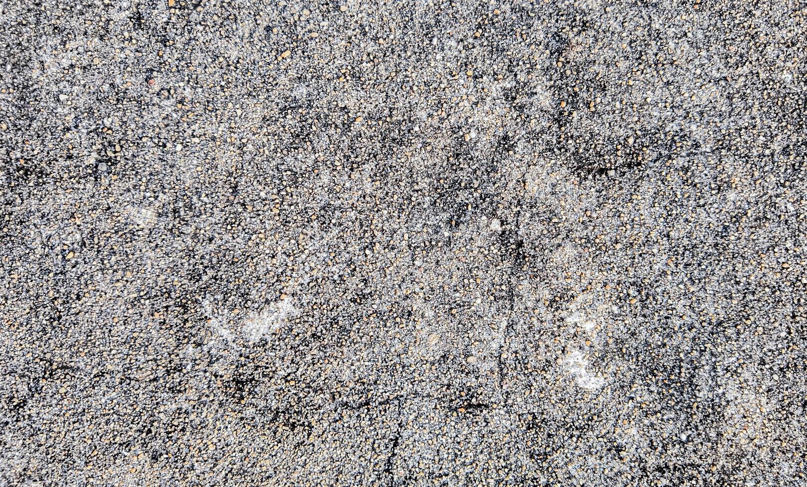 Textured Grey Asphalt Close Up for Backgrounds photo